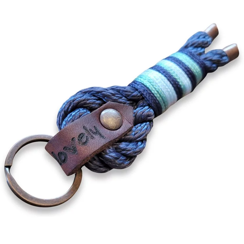 Schlüsselanhänger aus Tau Farbe denim blau gedreht Beschläge Farbe kupfer antik und Leder braun Schlüsselanhänger aus Tau Farbe denim blau gedreht Beschläge Farbe kupfer antik und Leder braun